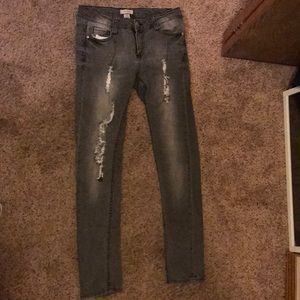 Black distorted skinny jeans